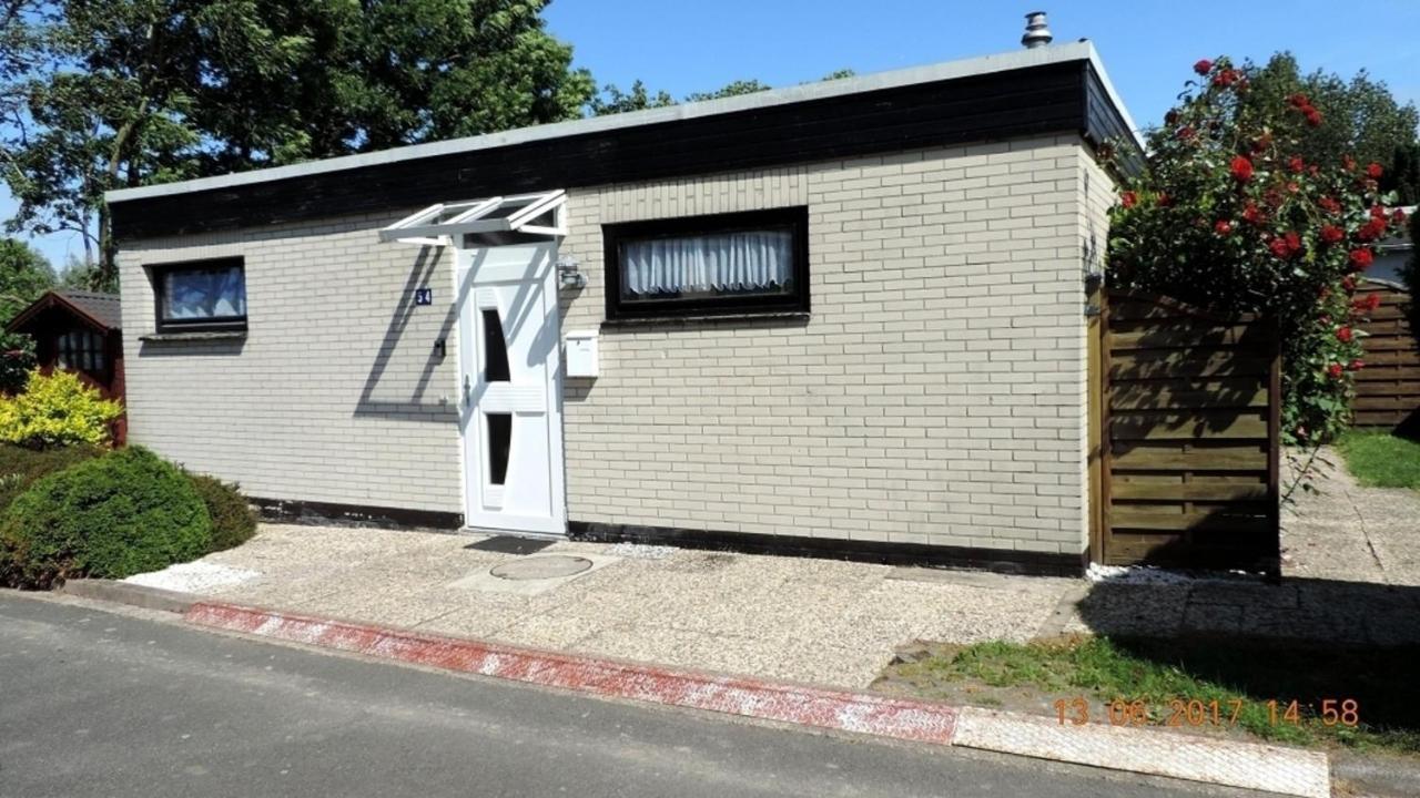 Bungalow 1930 In Tossens Bagian luar foto